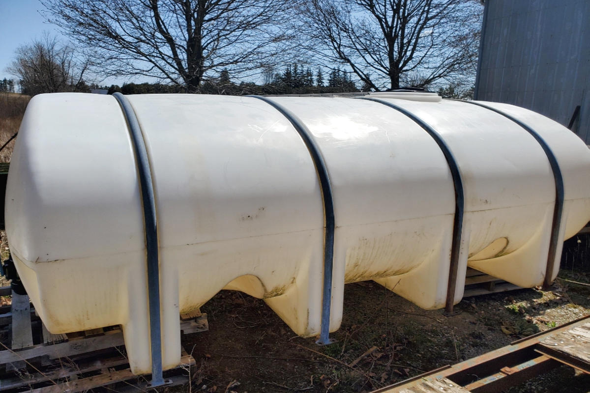 J and M Water Truck Inc. (Brantford) filling water for soil/grond compaction at a construction site foundation in or around Brantford Ontario.