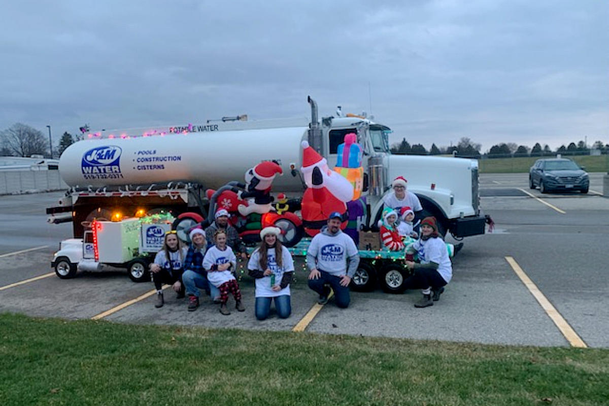 J and M Water Truck Inc. (Brantford) family, relatives and friends getting ready for the Christmas Santa Clause parade.