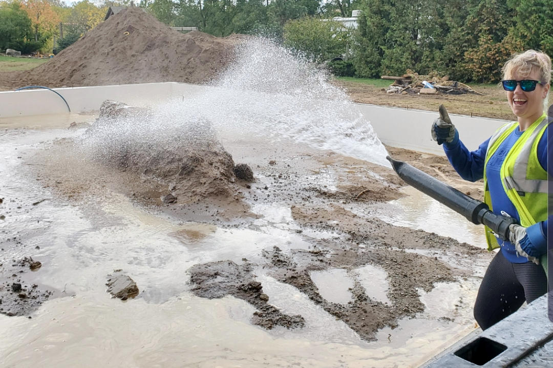 J and M Water Truck Inc. (Brantford) filling water for soil/grond compaction at a construction site foundation in or around Brantford Ontario.